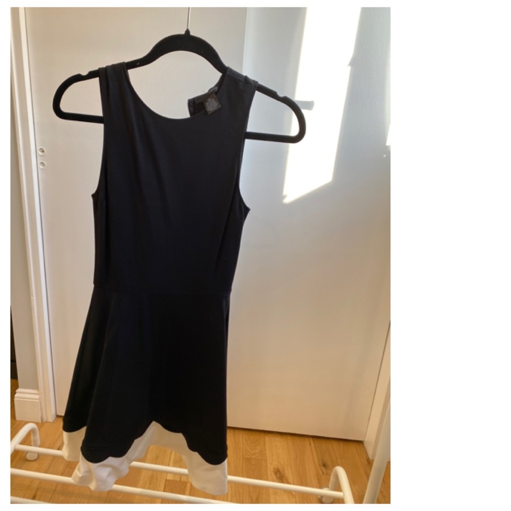 Black dress with white strip at the bottom